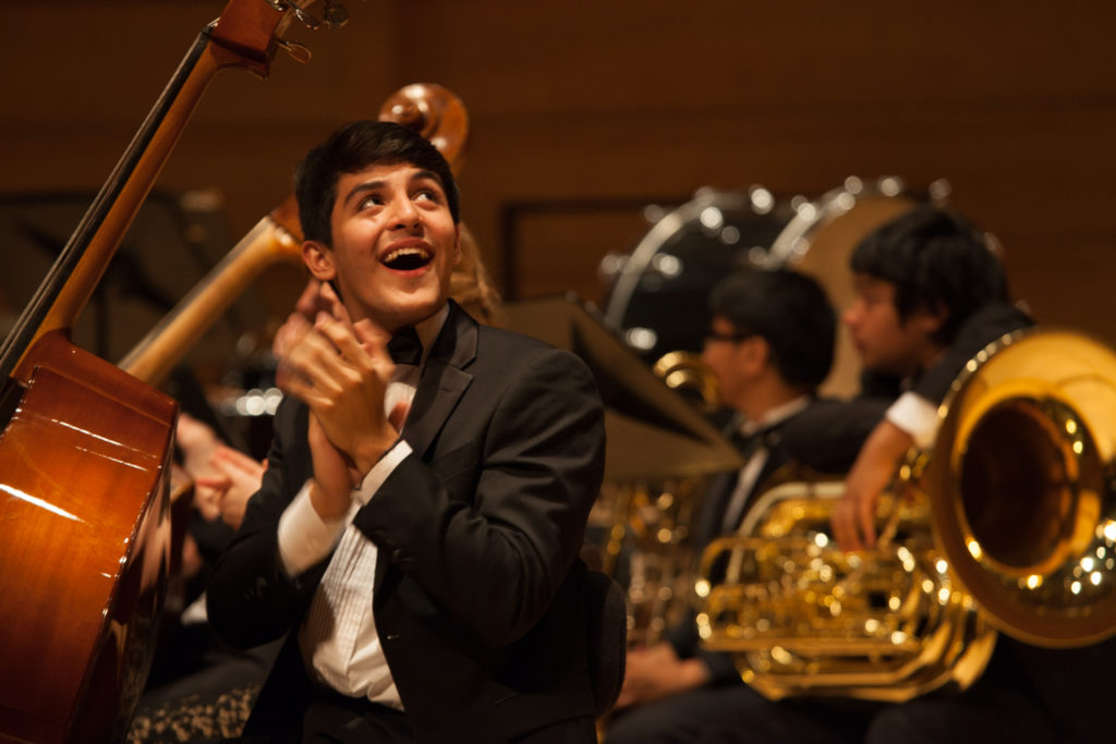 Excited musician in concert band