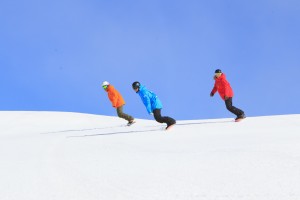 Mt Buller Three Snowboarders on Slopes